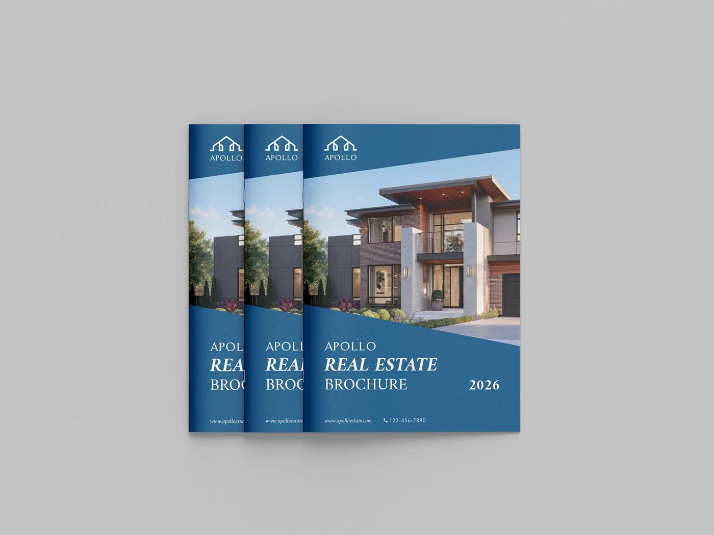 Stack of real estate brochures printed with glossy covers